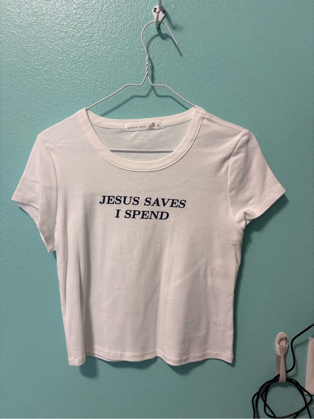 Altard state White baby tee Graphic Tee - "Jesus Saves I Spend"